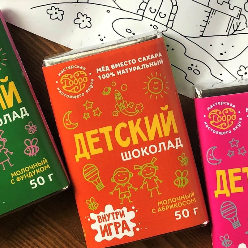 Детский шоколад молочный, 54% какао на меду с абрикосом